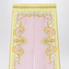 Versace Printed silk twill trousers in yellow/pink