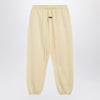 Fear of God Essentials Yellow jogging pants with logo