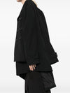Comme Des Garcons Complete with asymmetrical sleeves