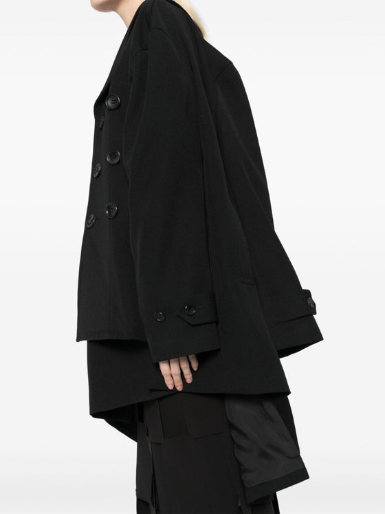 Comme Des Garcons Complete with asymmetrical sleeves