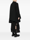 Comme Des Garcons Complete with asymmetrical sleeves