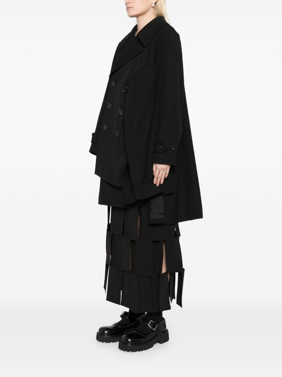 Comme Des Garcons Complete with asymmetrical sleeves