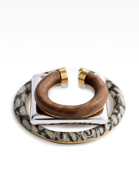 Jacquemus Trio of geometric ear-cuffs.