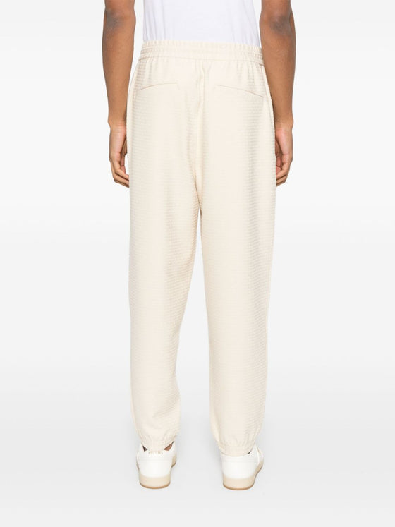 Emporio Armani ASV Lyocell blend jersey joggers with all-over lettering