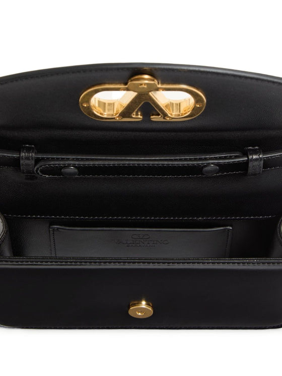 Valentino Garavani Vain small leather clutch