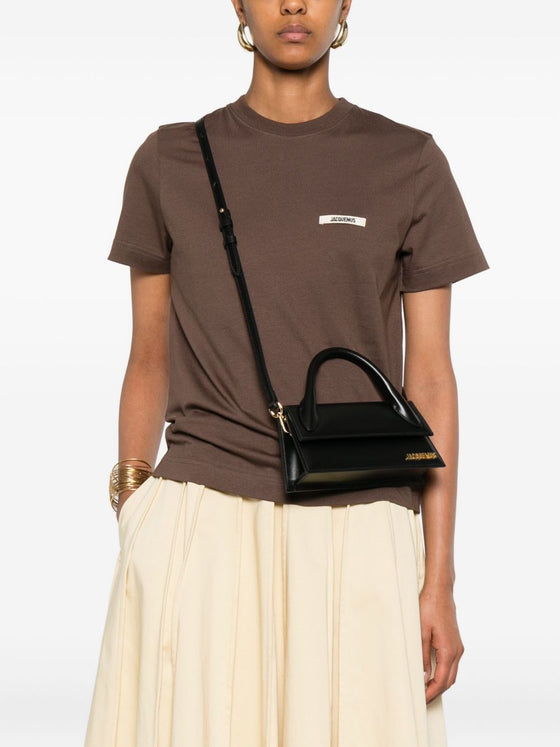 JACQUEMUS The long Chiquito leather bag.