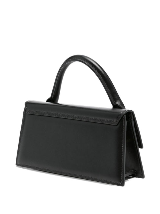 JACQUEMUS The long Chiquito leather bag.