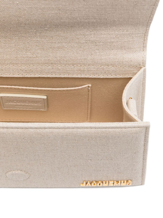JACQUEMUS The Big Child Shoulder bag with flap.