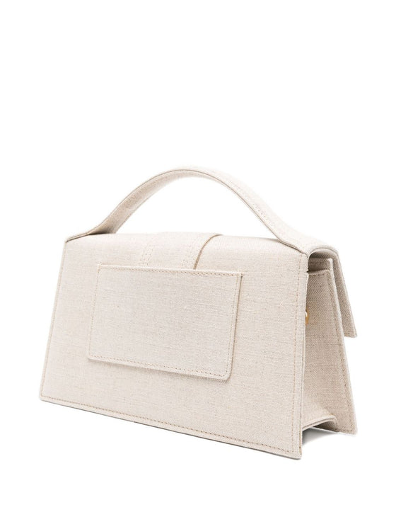 JACQUEMUS The Big Child Shoulder bag with flap.