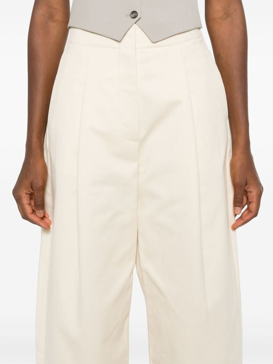 STUDIO NICHOLSON Trousers Beige