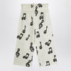 Mini Rodini Wide white trousers with musical notes