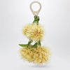 Christian Louboutin Leather bag charm in the shape of a mimosa