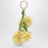 Christian Louboutin Leather bag charm in the shape of a mimosa