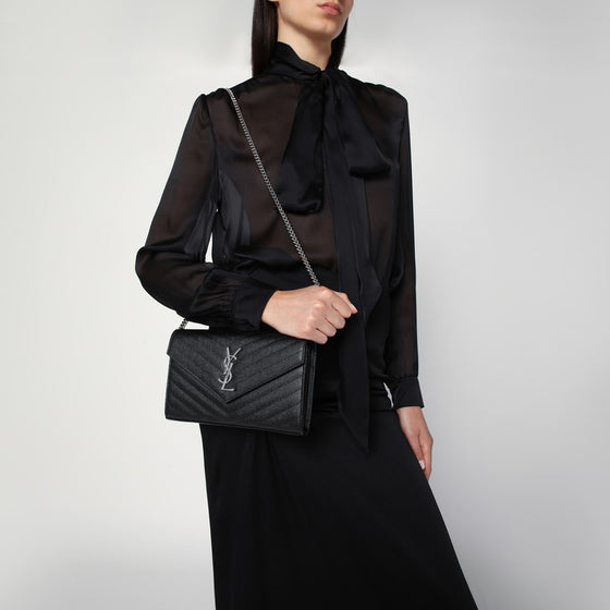 Saint Laurent Clutch with chain Cassandre black