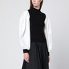 SIMKHAI Black Jackie turtleneck with white sleeves