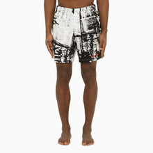  Alexander McQueen Abstract print swim shorts with logo