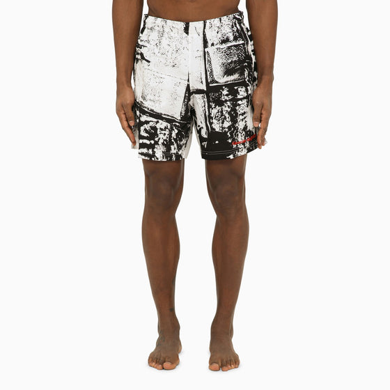 Alexander McQueen Abstract print swim shorts with logo