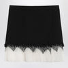 Alexander McQueen Mini skirt with black/ivory spider lace