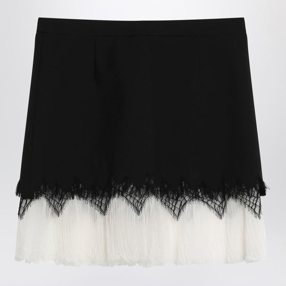 Alexander McQueen Mini skirt with black/ivory spider lace