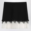Alexander McQueen Mini skirt with black/ivory spider lace