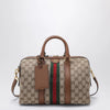 GUCCI Medium Ophidia duffle bag in beige and brown GG fabric