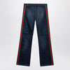 GUCCI Low-rise cotton denim Web tape trousers in blue