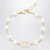 Valentino Garavani VLogo Signature bracelet in metal and pearls, gold/cream