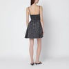 GANNI Black satin mini dress with polka dots