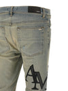 Amiri Staggered Logo Jeans