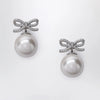 Self-Portrait SELF PORTRAIT Crystal bow and back pearl earrings in silver