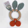 Bonpoint Orange bi-coloured crochet rattle