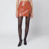 THE ANDAMANE Leather-effect mini skirt in tan