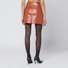 THE ANDAMANE Leather-effect mini skirt in tan