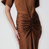 THE ANDAMANE Long Iris dress in bronze with gathered waist