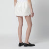 Dunst Cream mini skirt with overlapping panel