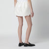 Dunst Cream mini skirt with overlapping panel