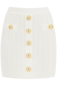  Balmain knit mini skirt with embossed buttons