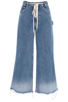  Closed wide leg jeans with distressed details.