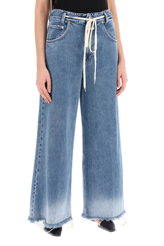 Closed wide leg jeans with distressed details.