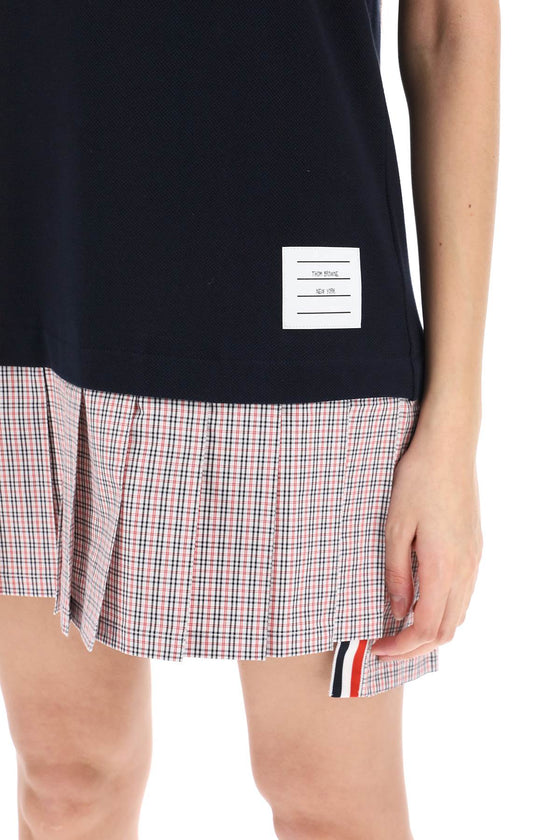 Thom browne mini polo-style dress with pleated bottom.
