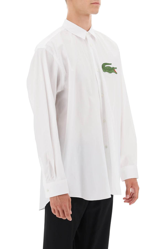 Comme des garcons shirt x lacoste oversized shirt with maxi patch