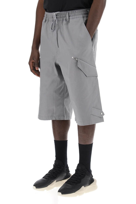 Y-3 canvas multi-pocket bermuda shorts.