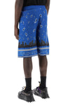 Off-white bermuda shorts with paisley pattern