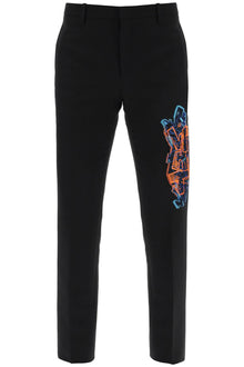  Off-white slim pants with graffiti patch