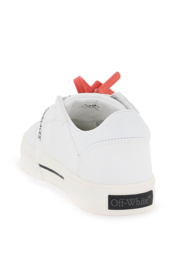 Off-white low canvas vulcanized sneakers in